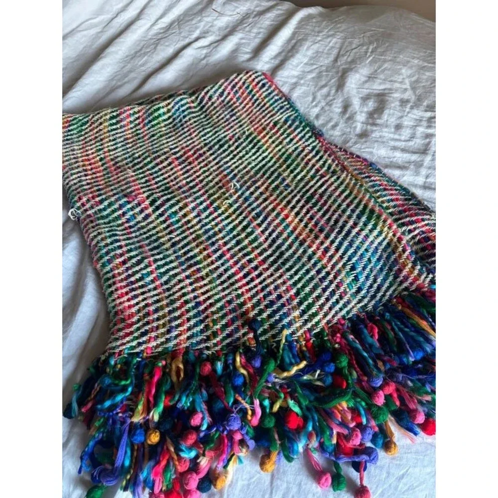 Colorful woven throw blanket with tassels/fringe